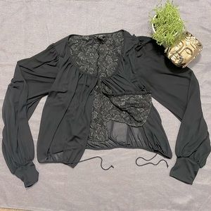 Sheer black blouse with lace lining